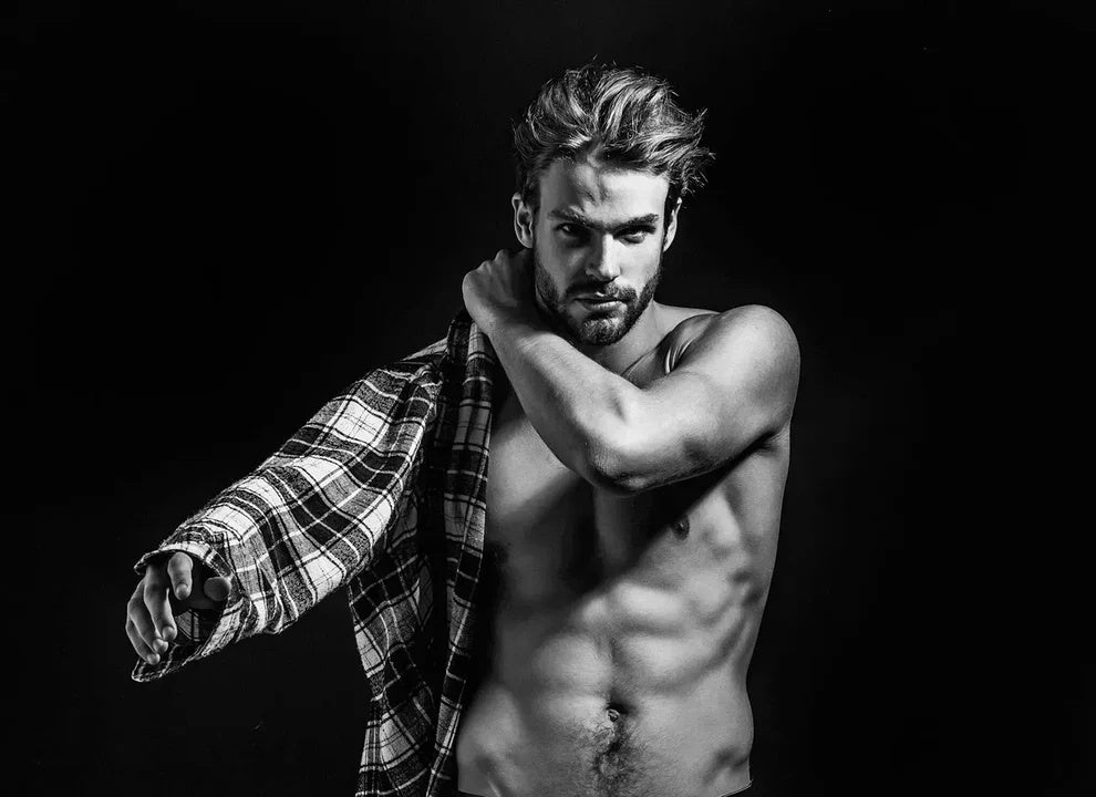 Man with a shirt over his shoulder 